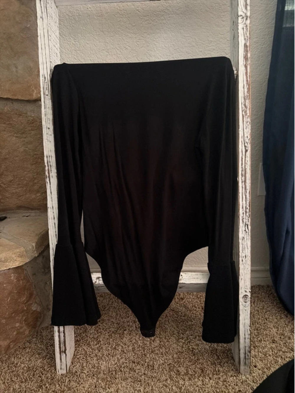 Black turtleneck and flared sleeve